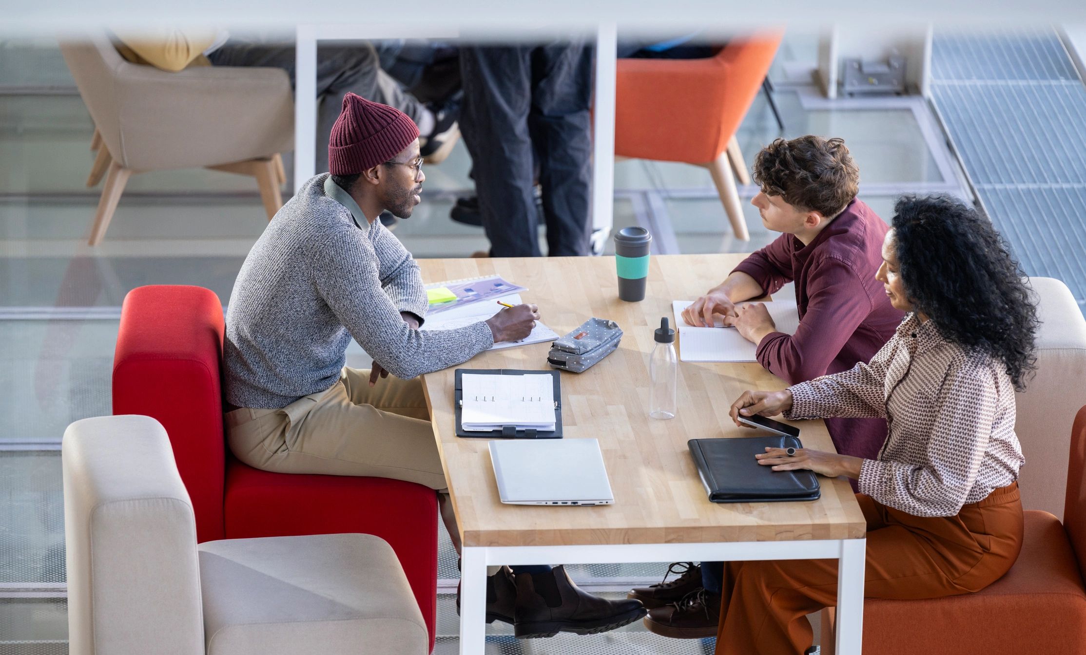 Professionals collaborating in a modern office